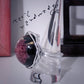 Florombra - Anello in alluminio wire con cabochon nero e fiore rosso antico con pagliuzze iridescenti