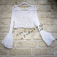 Etere Selvaggio – Crop Top Crochet a Rete con Maniche Ampie